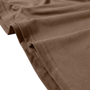 Close-up of brown knit polo shirt showing high-quality double-needle hem and seam craft