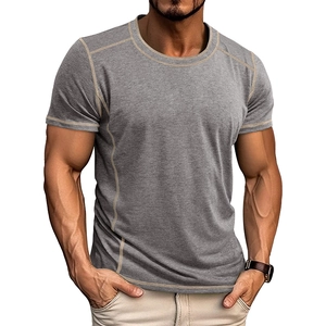 Detail of slim fit men's henley shirt with contrast stitching on grey knitted fabric