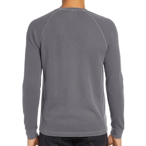 Back view of men's dark grey waffle knit henley shirt with raglan sleeves and texture