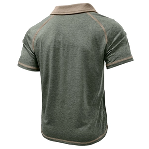 Back view of men's raglan sleeve polo shirt with contrast stitching in dark green texture