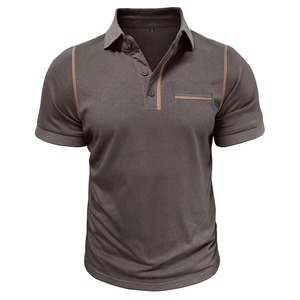 Close-up of contrast stitching on chest pocket of men's slim fit polo shirt in dark grey