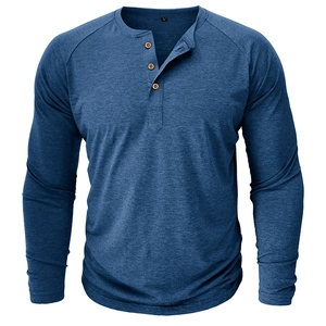 Detail of dark blue Henley shirt neckline with wood-textured buttons and raglan sleeves