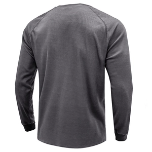 Rear view of dark grey waffle knit Henley shirt showing raglan sleeves and breathable texture