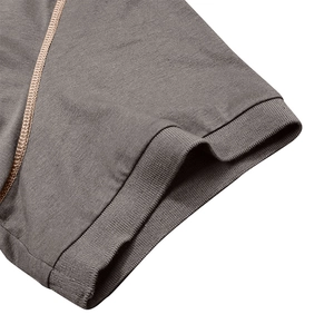 Detail of dark gray men polo shirt with contrast stitching and ribbed knit cuff