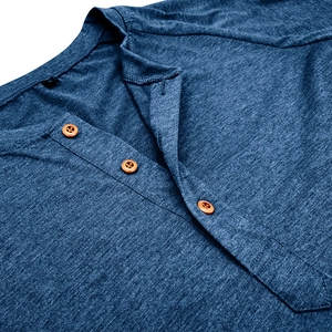 Detail shot of navy blue Henley shirt neckline with three brown wood-textured buttons