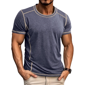 Detail of grey men's Henley shirt showing contrast stitching on crew neck and shoulders
