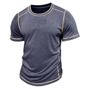 Detail of contrast stitching and heathered dark grey blue fabric on men's short sleeve shirt