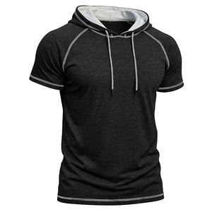 Macro detail of men's hooded t-shirt with white contrast stitching and jersey fabric texture