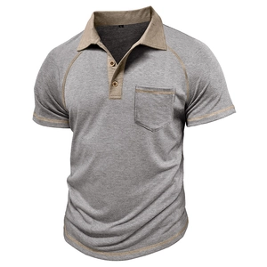 Close-up of contrast stitching and grey linen texture on men's polo shirt chest pocket