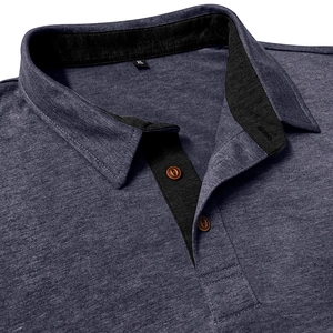 Close-up of polo shirt collar with navy grey texture and black contrast button placket