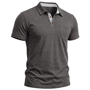 Detail of grey polo shirt featuring a functional chest pocket and white contrast collar lining