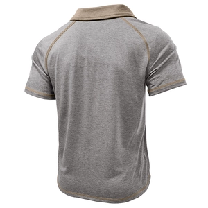 Detail view of grey short sleeve polo shirt featuring brown contrast collar and stitching