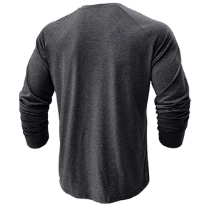 Back view of men's heathered dark grey long sleeve raglan tee shirt with round neck