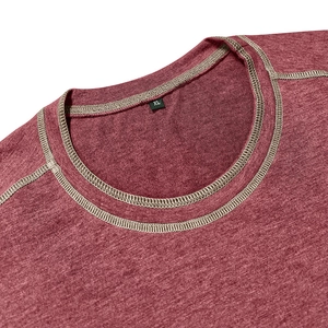 Detail of burgundy Henley T-shirt neckline with contrast stitching and size XL tag