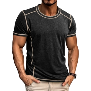 Detail of dark grey slim-fit Henley t-shirt featuring contrast stitching on seams