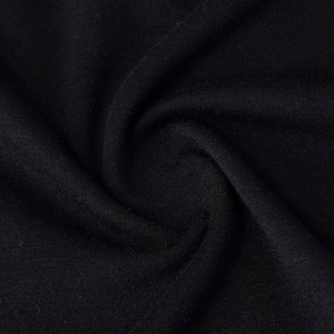Detailed close-up of soft black knit fabric texture for men's athletic thermal shirt