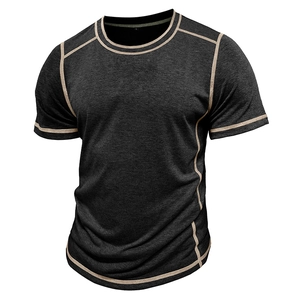Detailed view of grey short sleeve Henley shirt with contrast stitching and crew neckline