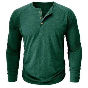 Detail of dark green Henley shirt neckline with classic three-button placket and raglan sleeves