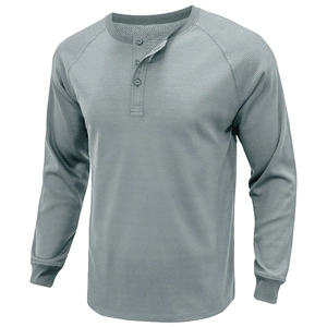 Close-up of waffle knit texture and three-button placket on grey long sleeve Henley shirt