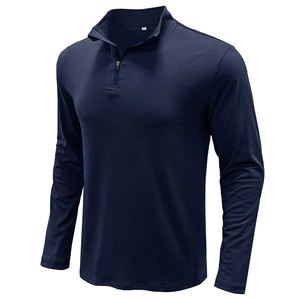 Detailed close-up of dark blue men's polo shirt with half-zip stand collar and inner size label