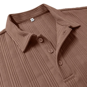 Detail of ribbed brown polo shirt collar with three buttons and white size L tag