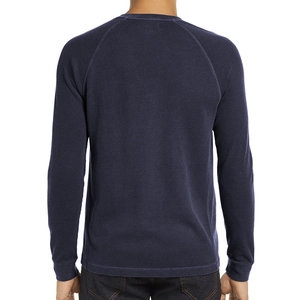 Rear view of navy waffle knit long sleeve henley shirt with raglan sleeves for men