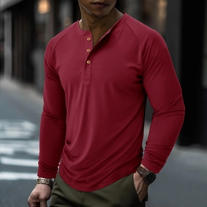 Detail of dark red Henley shirt collar with three-button placket and knit texture