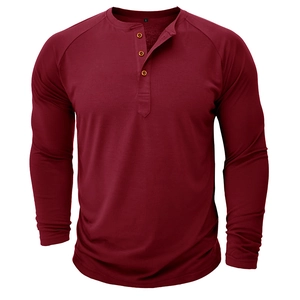 Detail view of burgundy Henley shirt neckline with wooden buttons and raglan sleeve seams