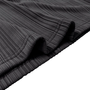 Close-up of dark grey ribbed knit fabric with soft texture and double-needle stitching