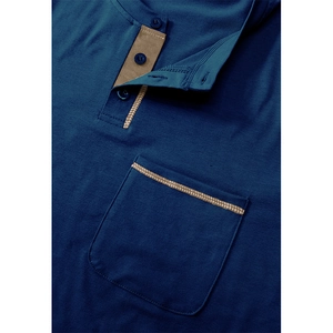 Close-up of men's Henley shirt collar with brown contrast placket and chest pocket detail