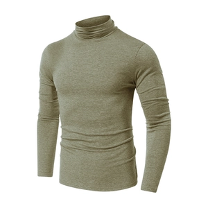 Detailed view of olive green slim fit turtleneck sweater with ribbed collar and cuffs
