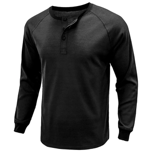Detailed macro view of black waffle knit fabric and three-button placket on henley shirt