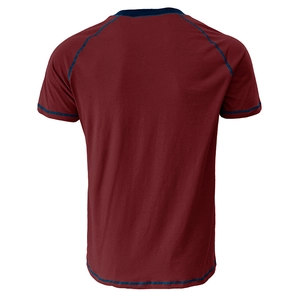 Detail view of burgundy raglan short sleeve shirt with navy blue flatlock contrast stitching