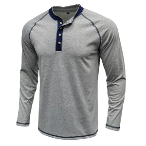 Men's vintage grey cotton Henley shirt with navy trim and long sleeves for casual wear.
