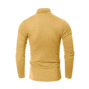 Detail of men's turtleneck sports t-shirt in mustard yellow with textured knit fabric