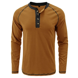 Front view of a men's ochre long sleeve Henley shirt with black contrast trim