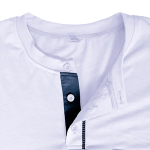 Detail of white Henley T-shirt neckline featuring a navy blue contrast inner button placket