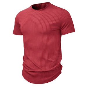 Close-up of red ribbed knit short sleeve T-shirt showing round neck detail and slim fit texture
