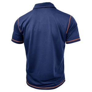 Detailed view of dark blue Polo shirt featuring breathable mesh fabric and orange stitching