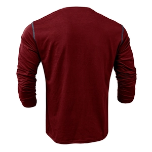 Detail view of burgundy Henley shirt showing blue contrast stitching on the shoulder seam