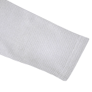 Detailed macro view of white waffle knit fabric texture and premium stitching on polo shirt