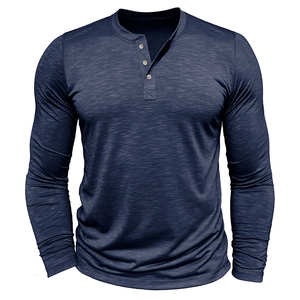 Detail of navy blue long sleeve Henley shirt featuring three-button placket and slub texture