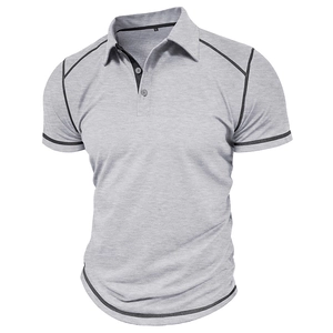 Detailed view of grey polo shirt with black contrast piping on collar and sleeve seams