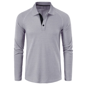 Detail of light gray waffle knit long sleeve polo shirt with raglan sleeves and collar