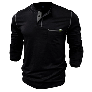 Detail of black knit Henley shirt with contrast gray stitching and buttoned neckline
