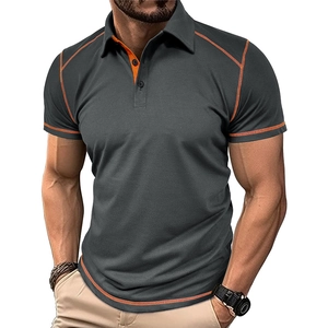 Detail of grey men's polo shirt with orange contrast stitching and raglan sleeve design