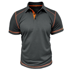 Detail of dark grey Polo shirt showing orange contrast stitching and breathable fabric texture