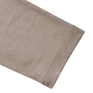 Close-up of slub cotton fabric detail and twin-needle stitching on men's Henley shirt