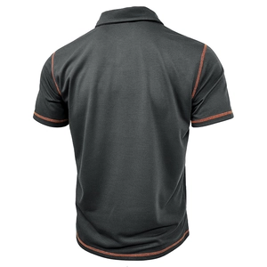 Rear view of men's polo shirt with orange contrast stitching on shoulders and hem