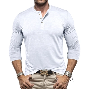 Detail of light gray slub cotton Henley shirt showing three-button collar and knit texture